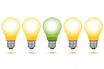 Orange Light Bulbs with Green Bulb in the Middle